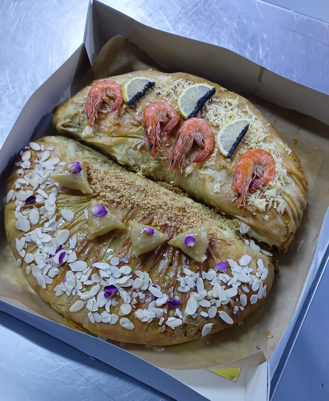 Bastilla Duo moitié fruit de mer moitié poulet amande