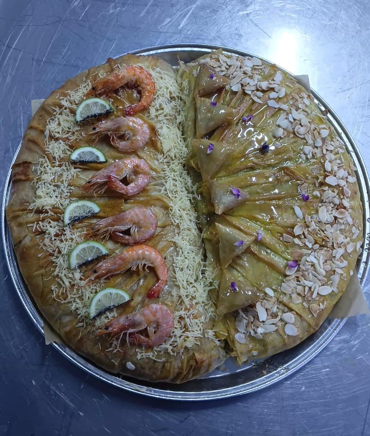 Bastilla Duo moitié fruit de mer moitié poulet amande